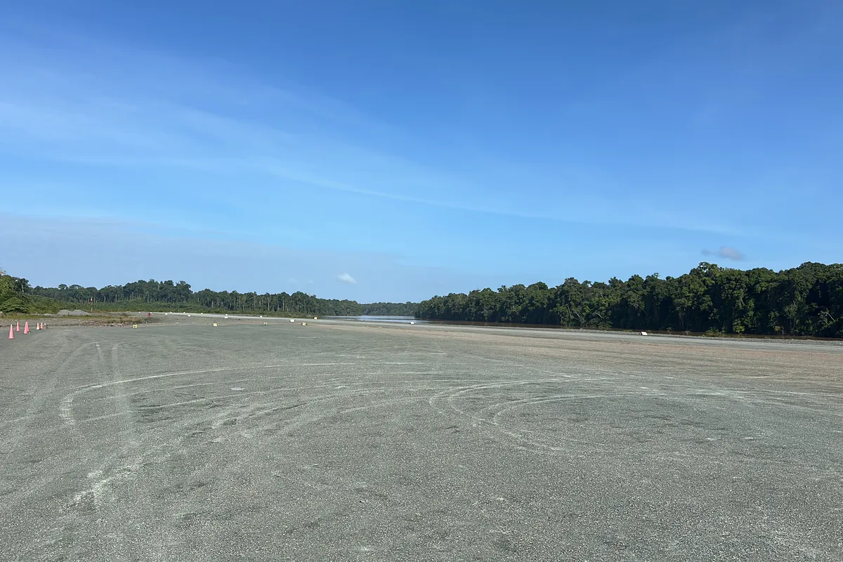 Remote gravel airstrip in South America where Aviation Renewables installed solar LED airfield lighting